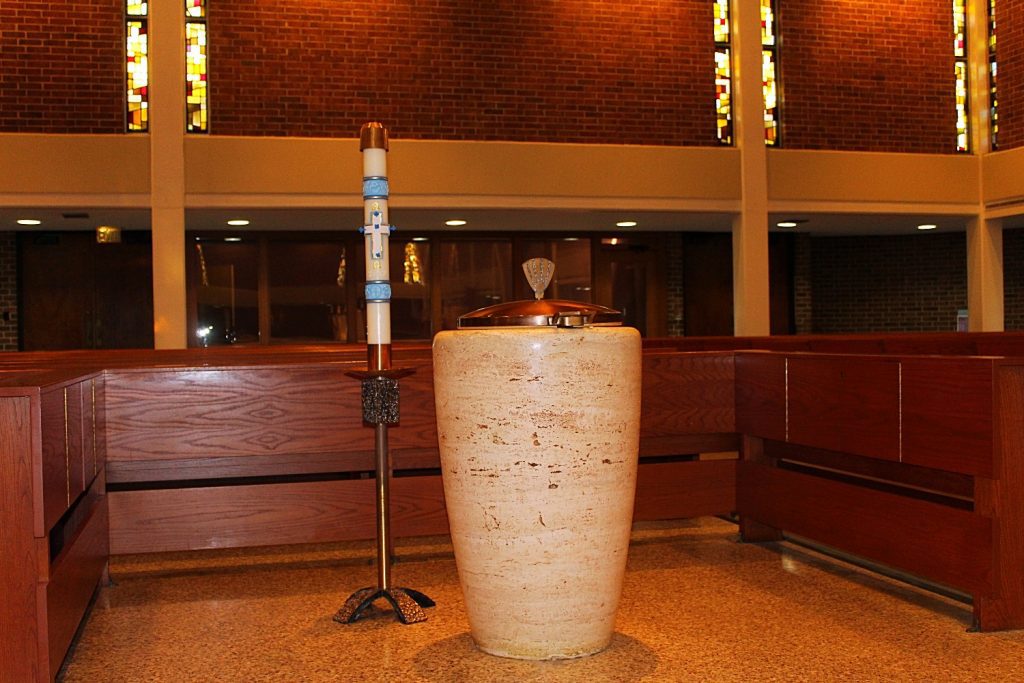 Baptism font and Paschal candle